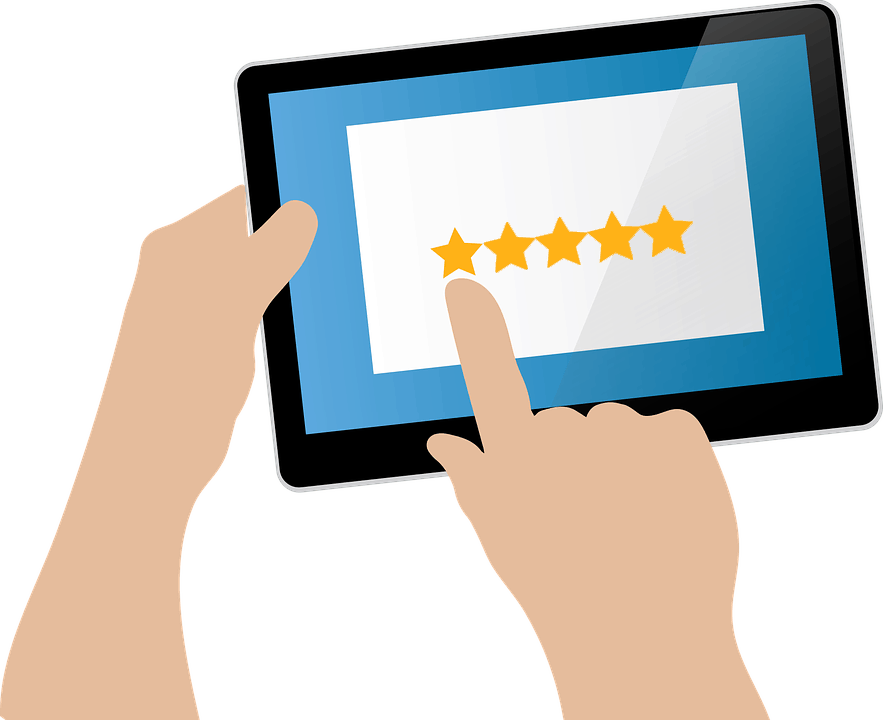 Illustration showing two hands holding a tablet. One hand is holding the tablet while the other points to a screen displaying a five-star rating. The background of the tablet screen is blue with white at the center showcasing the stars.