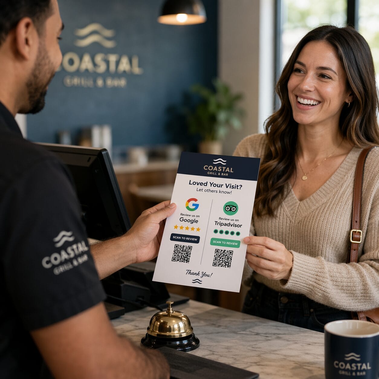 Business owner handing a dual Google and TripAdvisor review card to a happy customer